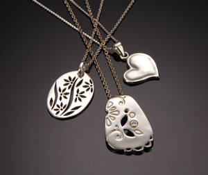 Tre sølv halssmykker 3