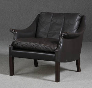 Dansk Møbelproducent. Hvilestol i sort skind.