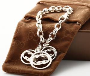 GUCCI. Armlænke med charms, sterling sølv