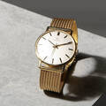HERRARMBANDSUR, Certina, 18k guld