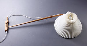 Le Klint. Væglampe udført i massiv udskåret teak. Ca. 1960
