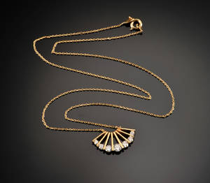 Guldhalskæde med syv brillanter - ca. 0.80 ct.