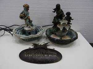 2st bordsfontäner  välkommen skylt