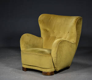 Flemming Lassen stil. Overpolstret lænestol