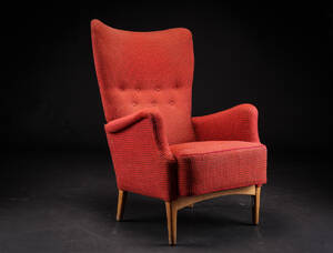 Dansk møbelarkitekt. Lænestol betrukket med uld