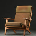 Hans J. Wegner. Højrygget lænestol af egetræ, model GE - 290A