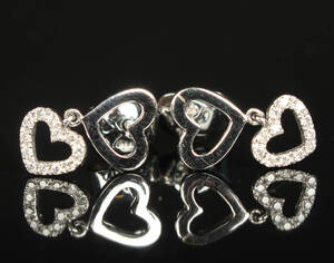 Par hjerteformede brillantørestikker, 0.06 ct.