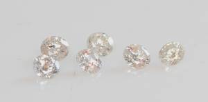 Seks uindfattede brillanter på ialt ca. 1.49 ct.