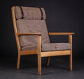 Hans J. Wegner, Højrygget lænestol af egetræ, model GE-265 