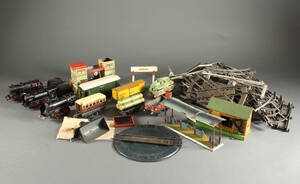 Samling bliklegetøj - primært toge med tilbehør