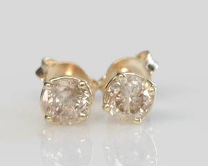 Par brillantørestikker, ca. 0.76 ct. 2