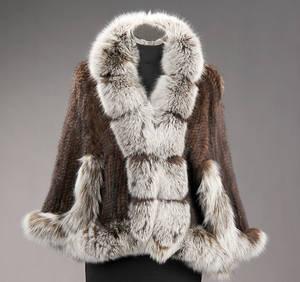 Slag af strikket mink med besætning af ræv. Str. 40-42