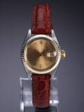 Rolex Date. Vintage dameur i 18 kt. guld og stål med champagnefarvet skive, ca. 1980 Denne vare er sat til omsalg under nyt varenummer 4701598