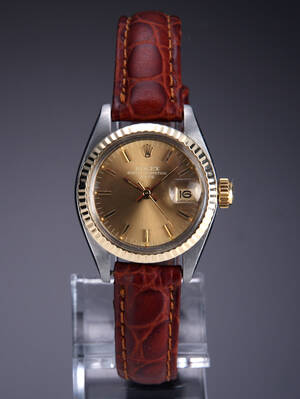 Rolex Date. Vintage dameur i 18 kt. guld og stål med champagnefarvet skive, ca. 1980 Denne vare er sat til omsalg under nyt varenummer 4701598