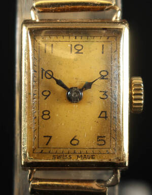 Vintage armbåndsur af 14 kt. guld. Vægt 22 gram