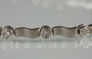 Armbånd 14 kt. med diamanter