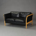 Dansk møbelproducent. 2-pers. sofa, sort skind