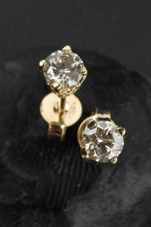 Par brillantørestikker, ca. 0.60 ct. 2