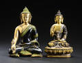 Et par buddhaer af messing, 19002000-tallet 2