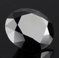 Uindfattet behandlet sort diamant ca 13.00  ct.