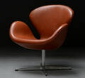 Arne Jacobsen. Lounge hvilestol Svanen  Red Label i cognac læder