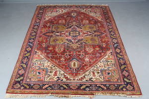 Orientalsk tæppe. 245x335 cm.
