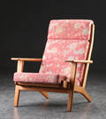 Hans J. Wegner. Højrygget lænestol af egetræ, model GE290A