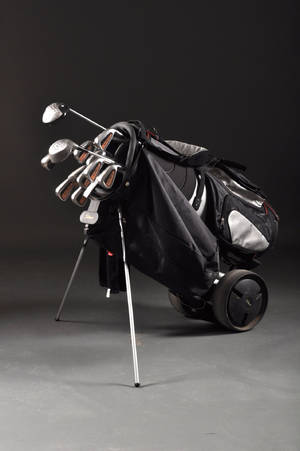 Golfbag med klubbor, bl.a. Titlest och Calaway 13