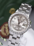 Rolex Oyster Perpetual Lady Datejust i stål med diamantskive og safirlynette - ca. 0.12 og 1.10 ct. Denne auktion er annulleret - se nu vare 1924298