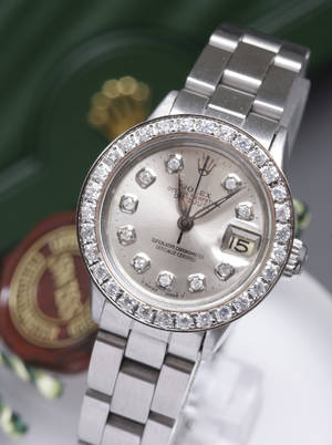 Rolex Oyster Perpetual Lady Datejust i stål med diamantskive og safirlynette - ca. 0.12 og 1.10 ct. Denne auktion er annulleret - se nu vare 1924298