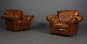 Italiensk design. Chateau d´ax.To lænestole betrukket med cognacfarvet læder. 2