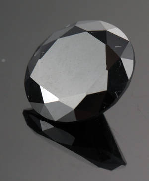 Uindfattet behandlet sort diamant ca 9.10 ct.