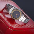 Cartier Santos. Damearmbåndsur af 18 kt. guld og stål Denne vare er sat til omsalg under nyt varenummer 4106403