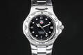 Tag Heuer Professional. Herreur i stål med sort skive med dato, 2000erne  Denne vare er sat til omsalg under nyt varenummer 4690124