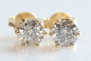 Par brillantørestikker, ca. 0.84 ct. 2