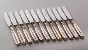 WS Sørensen Lotus tolv knive med skafter af sølv 12