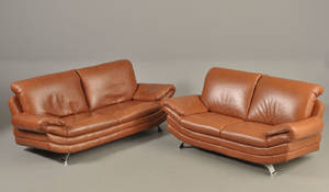 3-, og 2- pers sofa betrukket med brunt læder