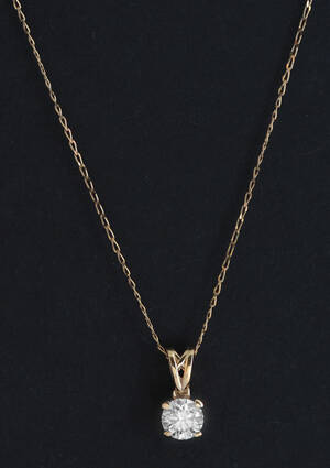 Pendant in 14k set with a brilliant cut diamond 0.43ct