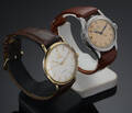 To vintage Omega, herrearmbåndsure