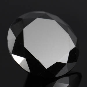 Uindfattet behandlet sort diamant ca 22.86 ct.