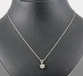 10K gold necklace set diamond cluster pendant approx. 0.20ct.