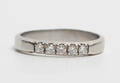 Alliancering med 5 brillanter, ca. 0.25 ct