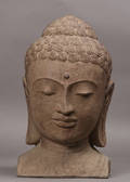 Støbt figur forestillende Buddha ansigt