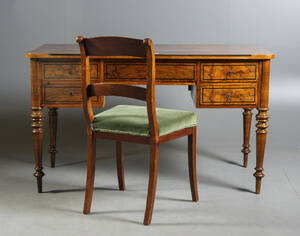 Skrivbord med fem lådor samt stol.1800-talets senare del. 2