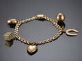 Bismarck armbånd af 14 kt. guld med charms. Denne vare er sat til omsalg under nyt varenummer 4414412