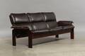 3 pers. sofa. formspændt finer med løse hynder af brunt læder. 