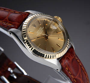 Rolex Date. Vintage dameur i 18 kt. guld og stål med champagnefarvet skive, ca. 1979 Denne vare er sat til omsalg under nyt varenummer 4888957