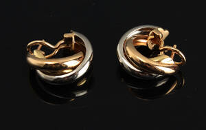 Cartier. Trinity ørestikkere, 18 kt guld 2