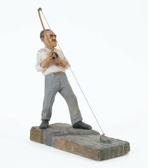 Träskuren och bemålad figur, daterad 56