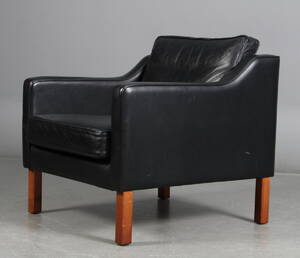 Mogens Hansen. Lænestol, sort læder.